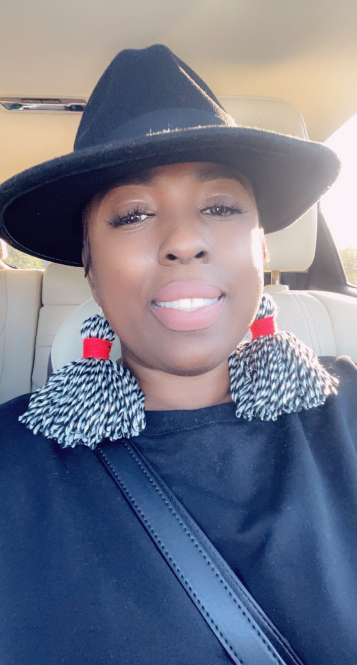 Red Eye Tassel Earring